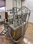 New 4 Head Piston Liquid Filler 100ml To 1000ml 316ss. Fixed Price $12500.00.