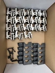 Tesla Zep Leveling Foot Attachment X18 With 10 Assorted Cable Clips. Fixed Price $50.00.