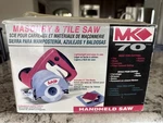 4 Masonry Saw Handheld Mk Diamond Mk-70 Brick Tile Cutter Brand New Open Box. Fixed Price $125.00.