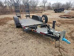 Mini Skid Steer Trailer Has Title. Fixed Price $2800.00.